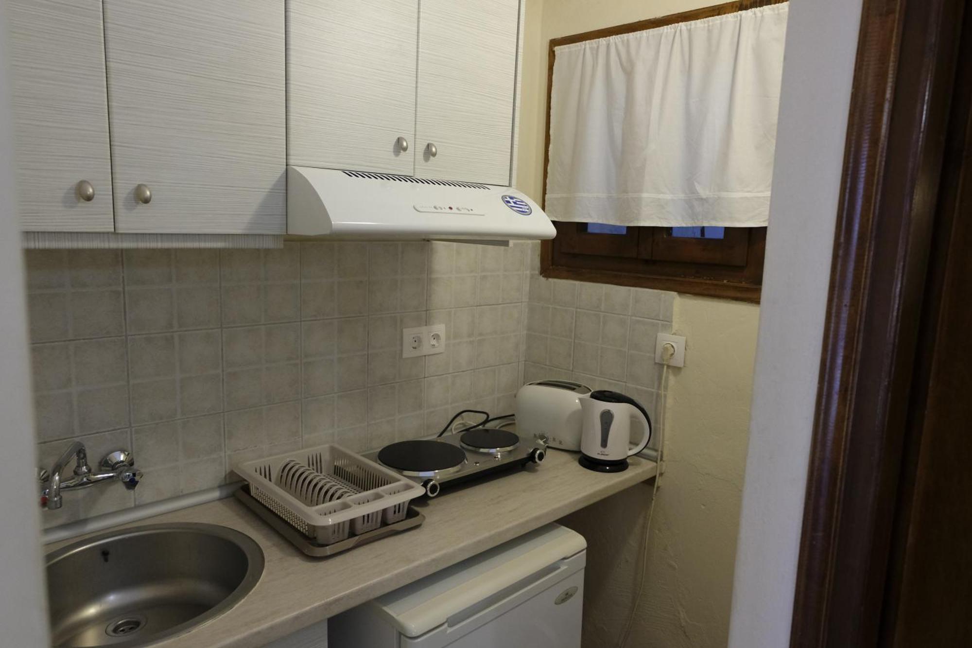 Taxiarchis Apartments Скиатос Номер фото
